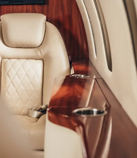 Executive jet interior with polished wood finishes